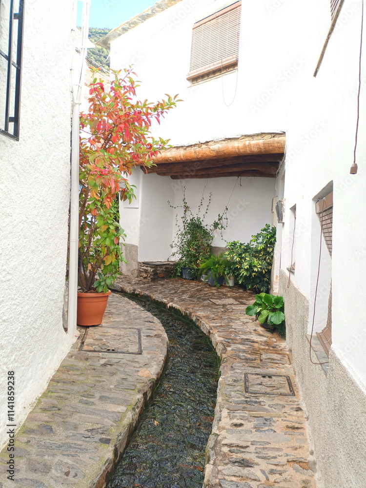 Naklejka premium Souvenir from Pampaneira, passageways, chimneys, Las Alpujarras, Granada, Spain,
