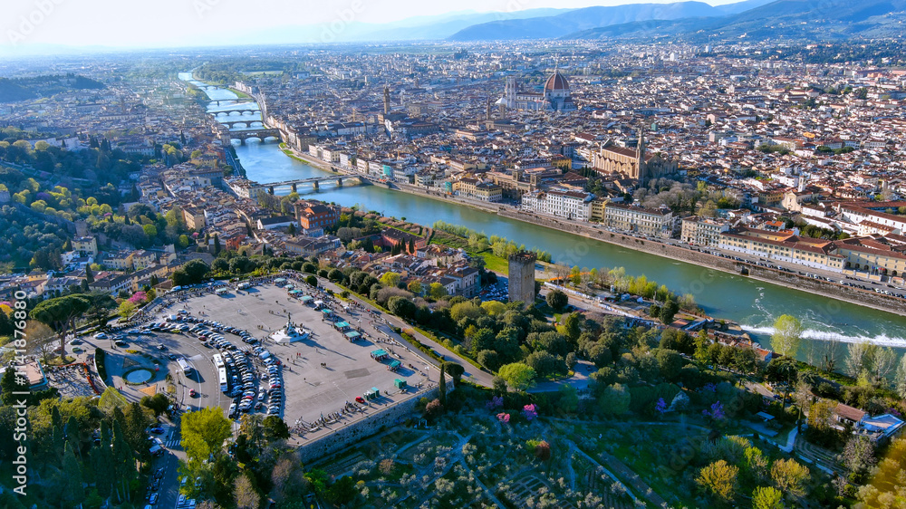 Beautiful aerial view of Florence, Italy featuring the Arno River, iconic bridges, lush green spaces, and Renaissance architecture. Perfect for travel, culture, and urban visuals. Beautiful aerial view of Florence, Italy featuring the Arno River, iconic bridges, lush green spaces, and Renaissance architecture. Perfect for travel, culture, and urban visuals.