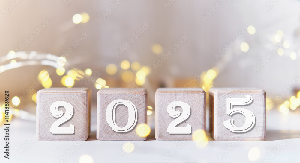 New year 2025 on wooden cubes. Star lights New year 2025 on wooden cubes. Star lights