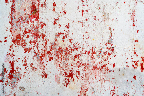 A weathered wall featuring peeling red paint on a white background. The distressed texture creates an abstract pattern with cracks, chipped areas, and uneven surfaces, making it ideal for projects
