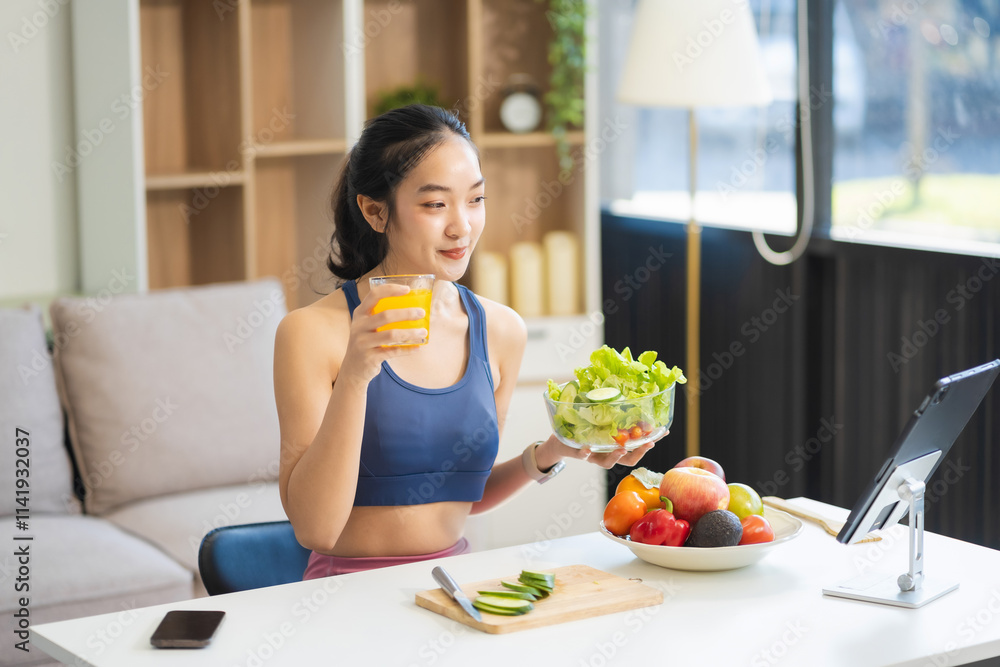 Fit woman enjoys healthy fruit breakfast after yoga training. fitness, nutrition, healthy lifestyle.