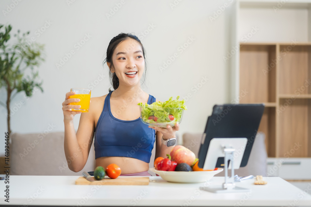Fit woman enjoys healthy fruit breakfast after yoga training. fitness, nutrition, healthy lifestyle.