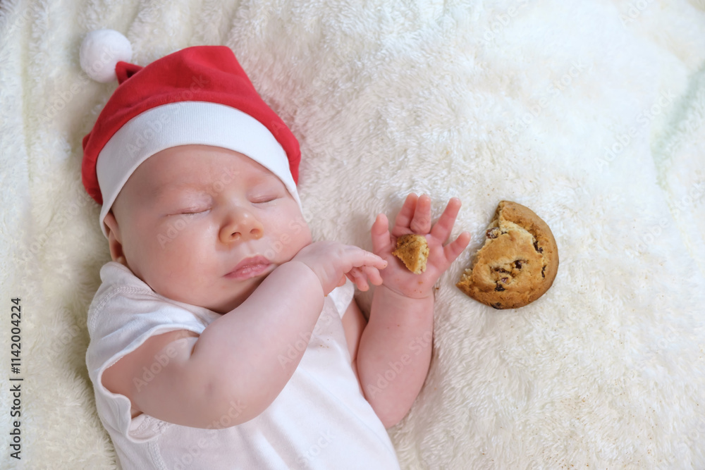 Φωτογραφία Two-Month-Old Baby in a Christmas Outfit with Milk and Cookies
