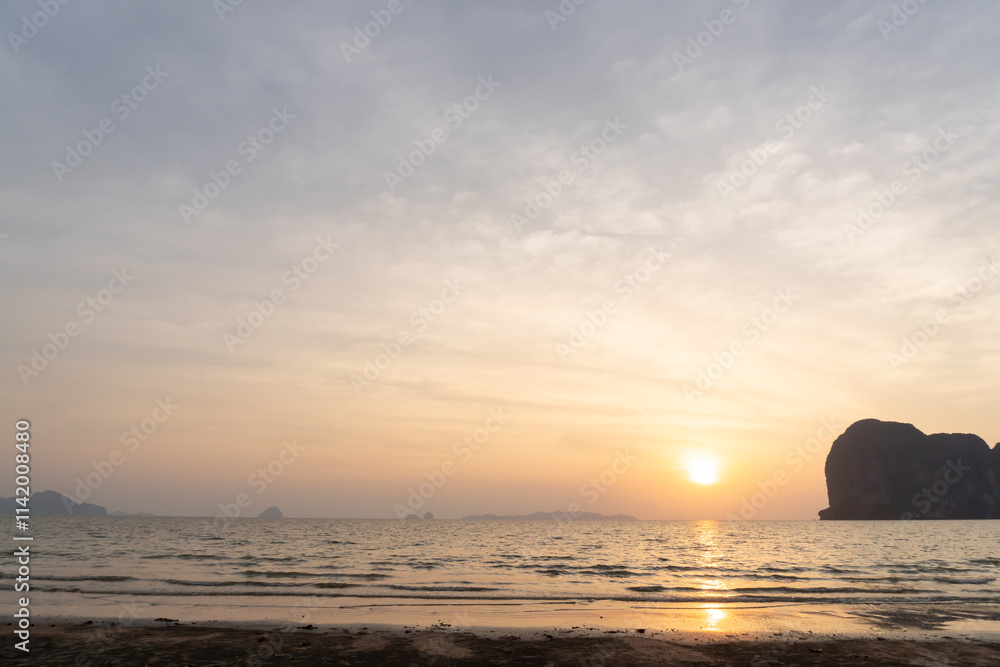 Sunsets or sunrises at the sea and beach in the beautiful morning or evening blue and orange sky used as natural blackground texture. Sunsets or sunrises at the sea and beach in the beautiful morning or evening blue and orange sky used as natural blackground texture.