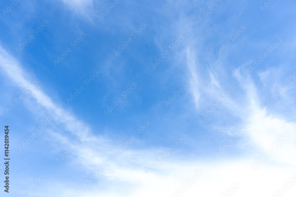 Low angle view and full frame of beautiful blue sky with strange shape of clouds in the morning or evening in sunny day used as natural background texture in decorative art work Low angle view and full frame of beautiful blue sky with strange shape of clouds in the morning or evening in sunny day used as natural background texture in decorative art work