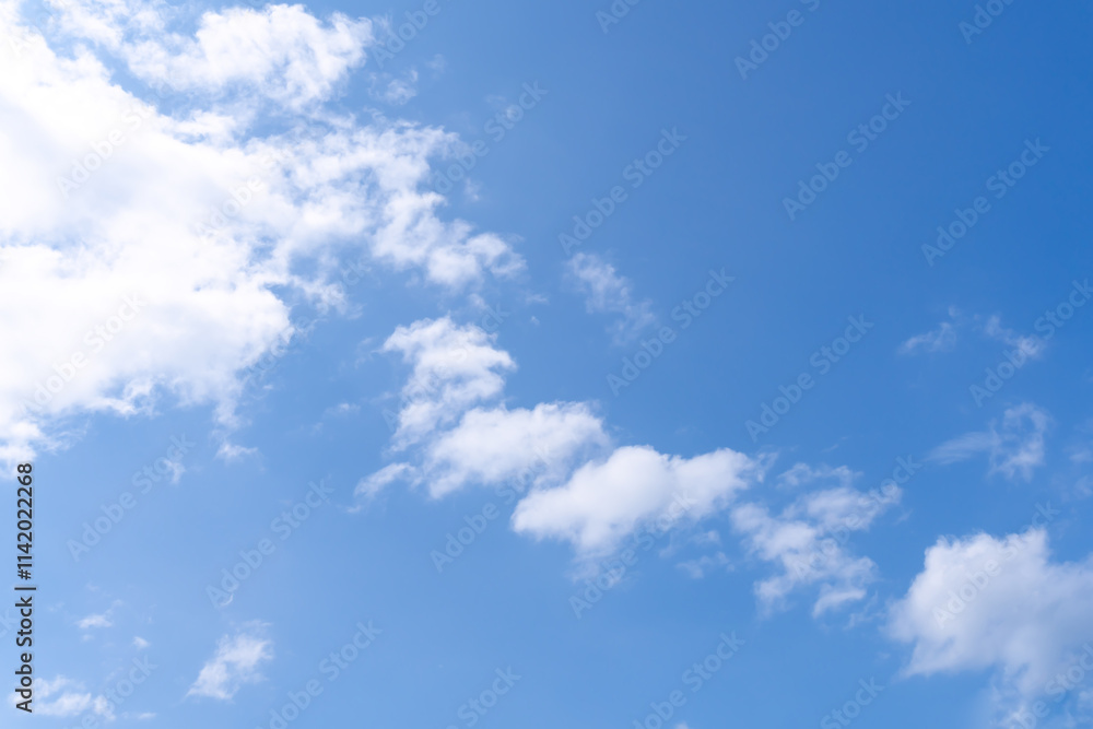 Low angle view and full frame of beautiful blue sky with strange shape of clouds in the morning or evening in sunny day used as natural background texture in decorative art work Low angle view and full frame of beautiful blue sky with strange shape of clouds in the morning or evening in sunny day used as natural background texture in decorative art work