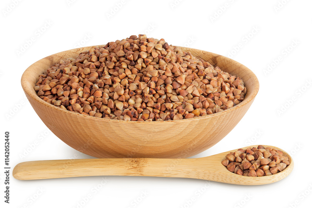 Raw buckwheat in wooden bowl isolated on white background Raw buckwheat in wooden bowl isolated on white background