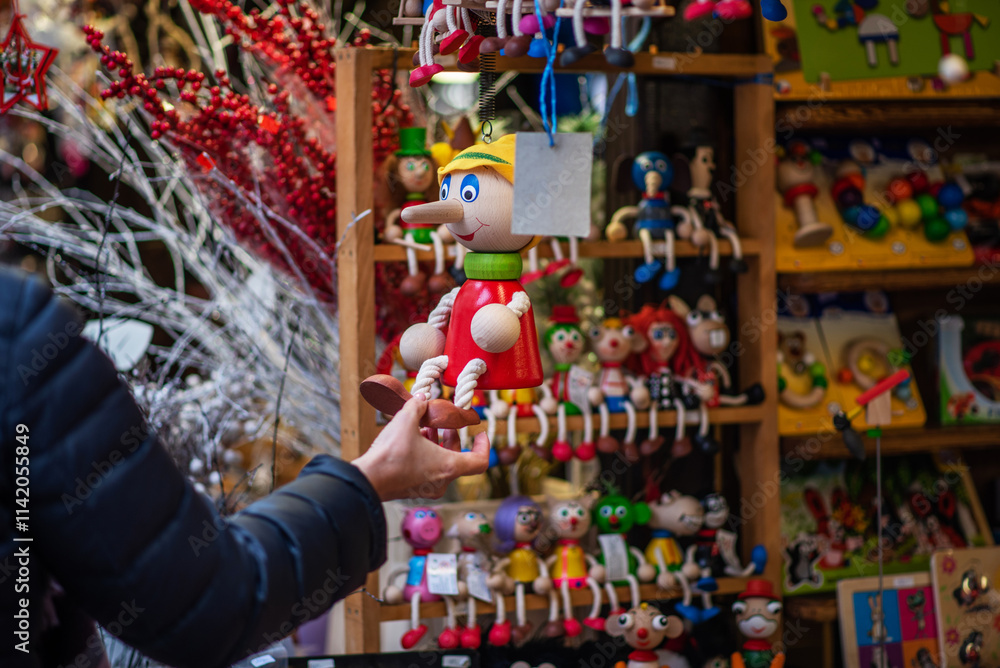 The buyer chooses environmentally friendly plastic-free toys for babies. Wooden toy for a child. Colorful. Crafts. Handmade. The buyer chooses environmentally friendly plastic-free toys for babies. Wooden toy for a child. Colorful. Crafts. Handmade.