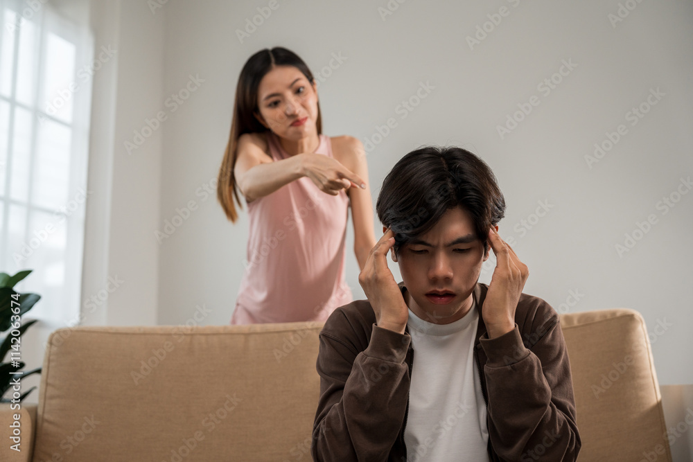 Relationships problems conflicts in marriage. Depressed stressed violence young couple man and woman Argument fighting shouting in the house. Making decision of breaking up get divorced. Harassment Relationships problems conflicts in marriage. Depressed stressed violence young couple man and woman Argument fighting shouting in the house. Making decision of breaking up get divorced. Harassment