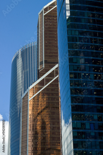 Glass facade of skyscrapers located in the business center of Moscow.