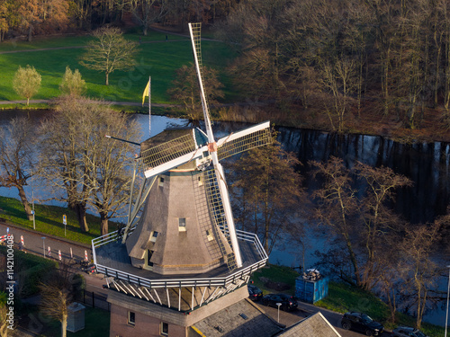 Aerial view of historic Dutch spice wind mills at Kralingen, Rotterdam, Holland in fall photo