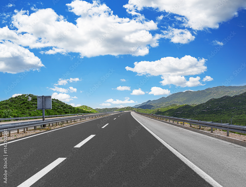 Countryside highway in a beautiful mountainous area.