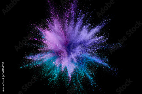 Colored powder explosion. Abstract closeup dust on backdrop. Colorful explode. Paint holi