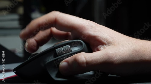 computer mouse in hand