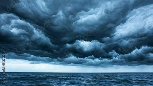 Stormy Seascape: A dramatic, ominous sky filled with dark, swirling clouds hangs low over the vast, choppy ocean, evoking a sense of impending tempest.