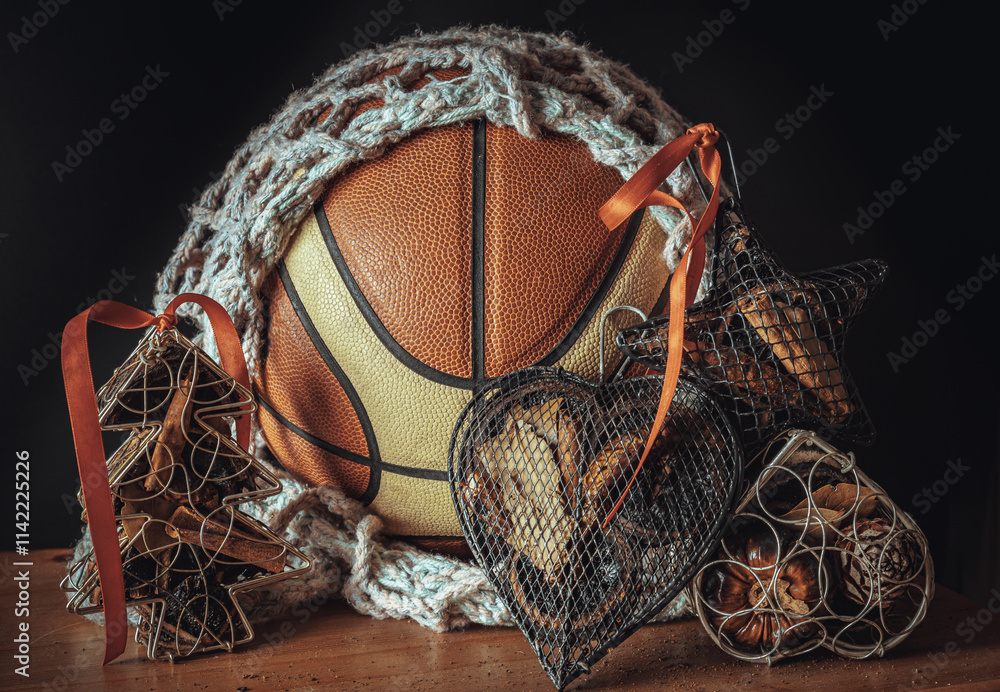 Basketball ball inside of mesh net string decoration with Christmas tree mesh case, Heart mesh case, Star mesh case on Dark background. Christmas-themed event basketball idea, Sports play on christmas