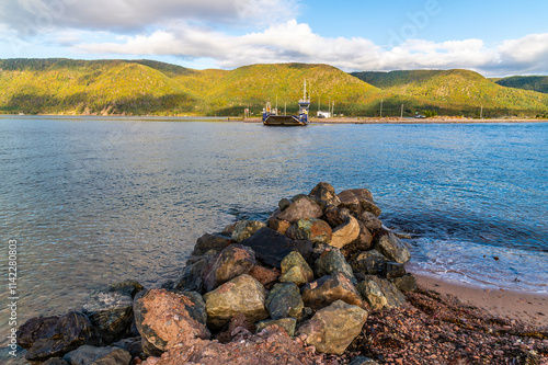 A view from the south shore looking across towards the Englishtown Ferry on the Cabot Trail, Nova Scotia, Canada in the fall photo