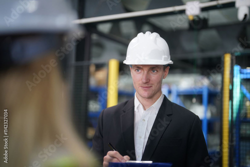 Professional Discussion in a Warehouse Setting With a Safety-Focused Approach and a Formal Appearance