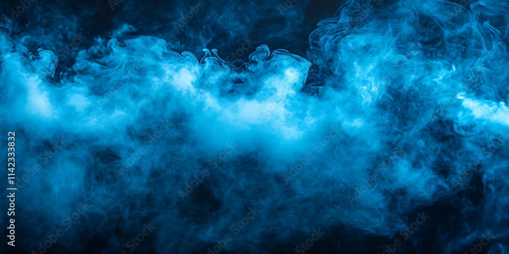 Obraz premium Abstract blue smoke swirls on black background.