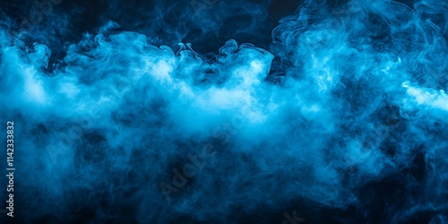 Abstract blue smoke swirls on black background.