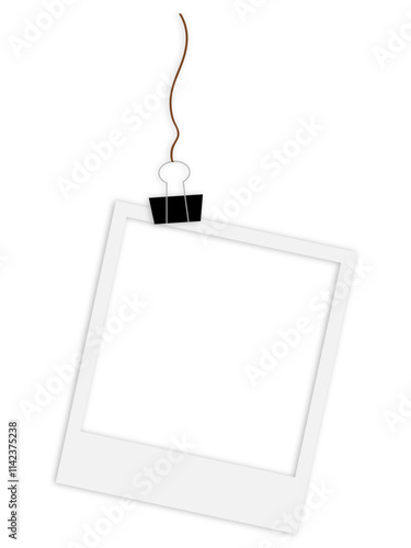 blank polaroid photo frame hanging from a string