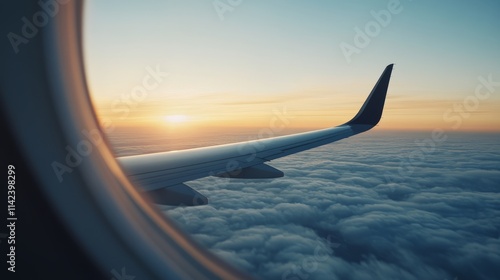 Obraz na płótnie Morning flight with sunlight wing of plane over city view airplane flying above clouds blue sky scenic view from window commercial airline flight mechanics concept w salonie