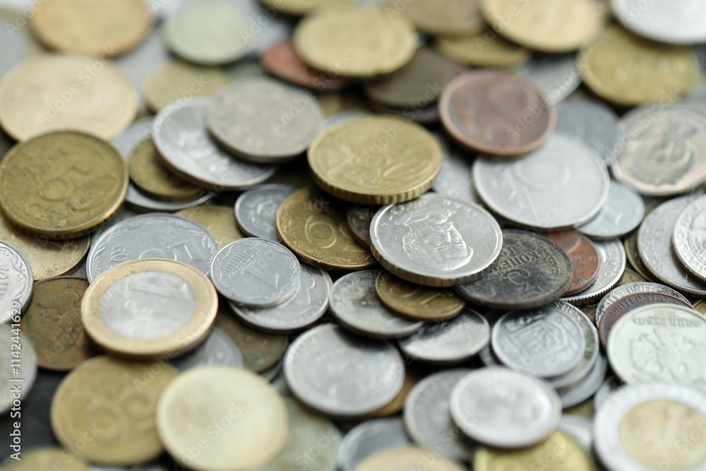 Big pile of different coins from various currencies and different countries around the world. Currency exchange Big pile of different coins from various currencies and different countries around the world. Currency exchange