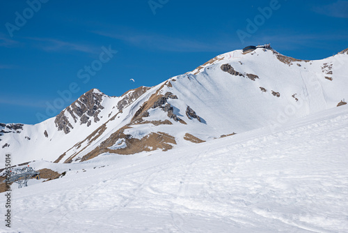 top station of the gondola lift at the Nebelhorn summit, with mountain restaurant. winter sports area in Oberstdorf photo