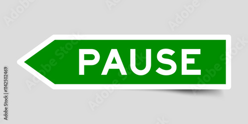Green color arrow shape sticker label with word pause on gray background