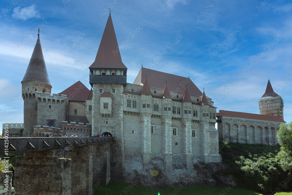 Romania Corvin Castle on a cloudy summer day Romania Corvin Castle on a cloudy summer day