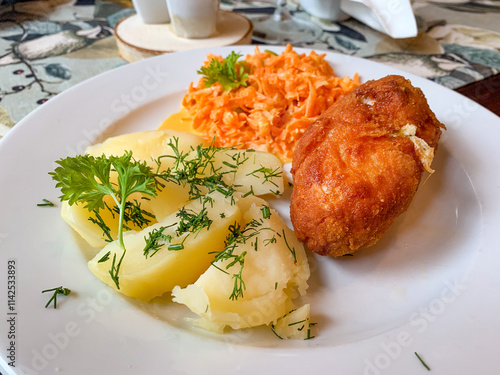 Devolay rolls with potatoes and  carrot salad.