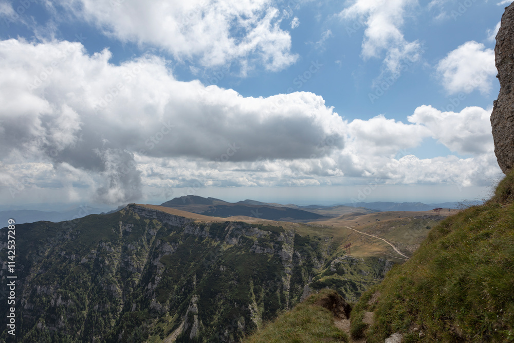 Naklejka premium Romania Busiegi Mountains on a cloudy summer day