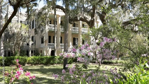 A historic antebellum home known as The Castle or the Joseph Johnson House is seen with azalea blooms in Beaufort, South Carolina.