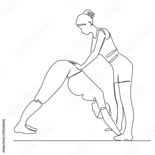 Yoga instructor doing adho mukha svanasana on pregnant woman