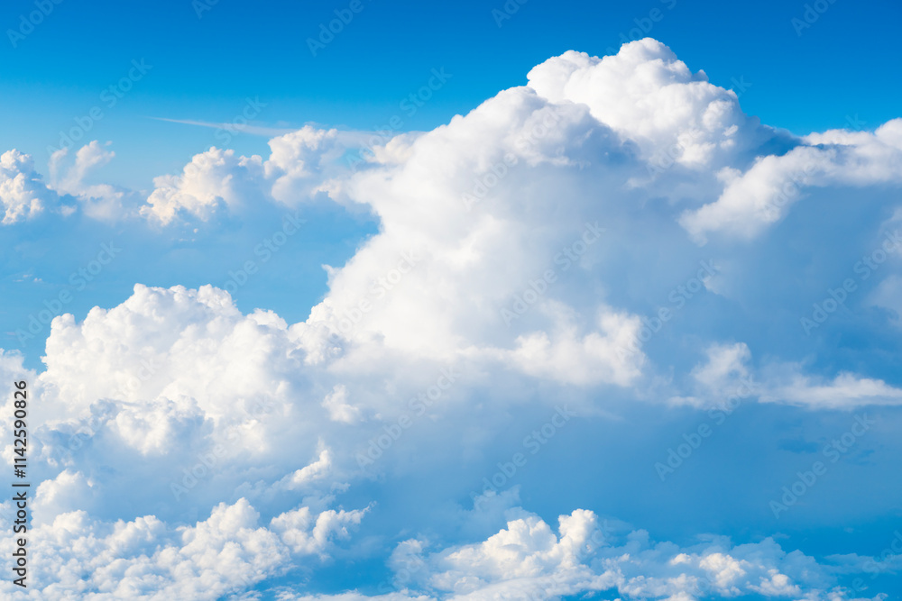 Blue sky with clouds in the sky. Beautiful blue sky background with clouds.Natural and cloudy fresh blue sky background. White fluffy clouds in the blue sky.