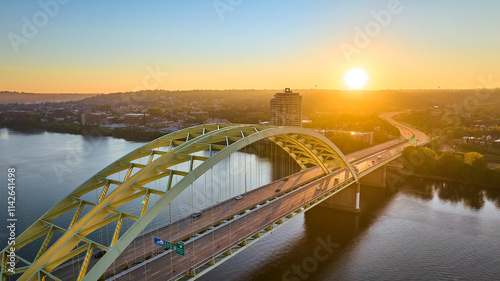 Fotografija Aerial of Daniel Carter Beard Bridge at Sunrise Over Ohio River