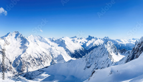 A panoramic view of majestic snow-covered peaks stretching across the horizon under a clear blue sky, with crisp, vivid details capturing the serene alpine landscape.