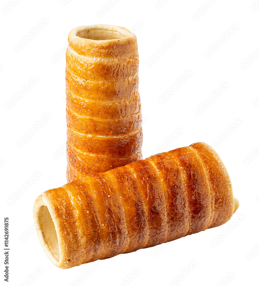 Two delicious, freshly baked chimney cakes Two delicious, freshly baked chimney cakes