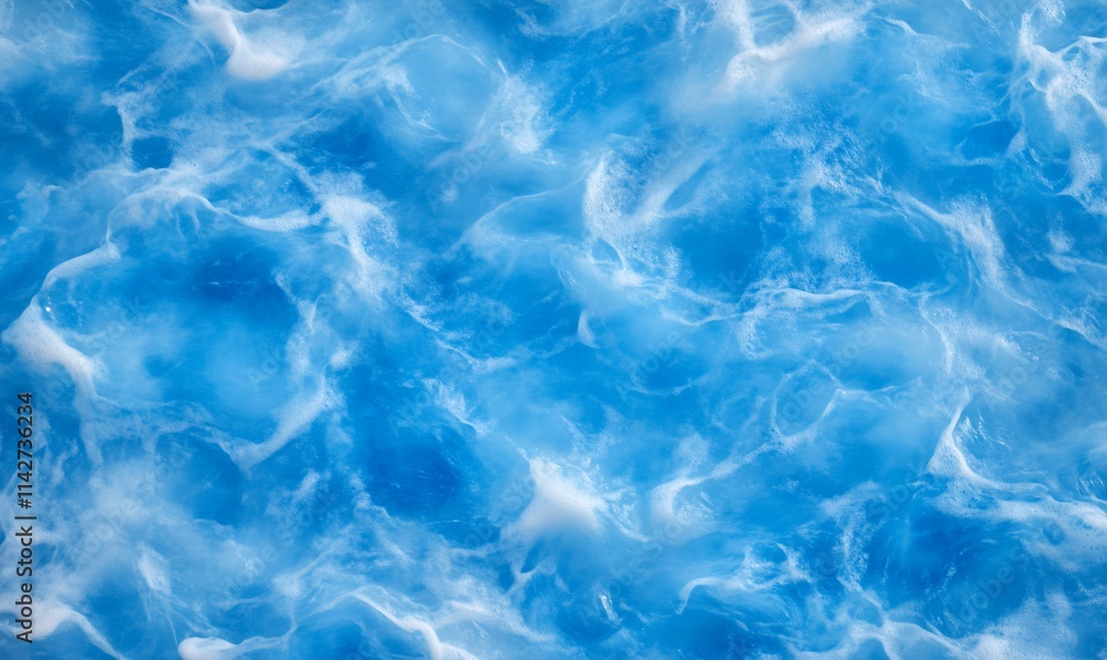 Abstract blue water texture with swirling patterns and white highlights. Abstract blue water texture with swirling patterns and white highlights.