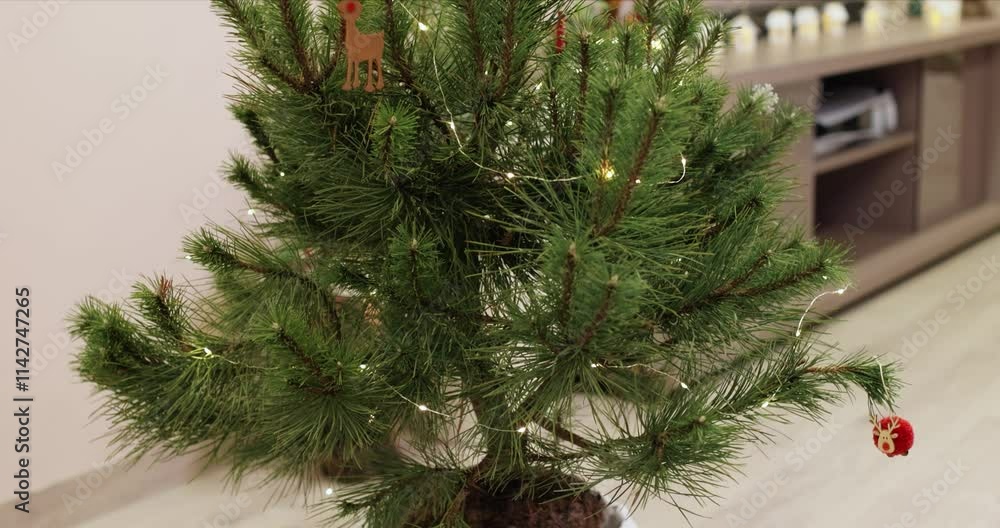Christmas tree decoration wooden toy on branch tree, Happy New Year. Christmas tree decoration wooden toy on branch tree, Happy New Year.