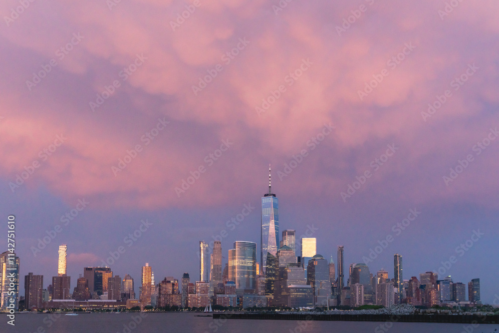 Pink mammatus clouds over Manhattan downtown skyline Pink mammatus clouds over Manhattan downtown skyline