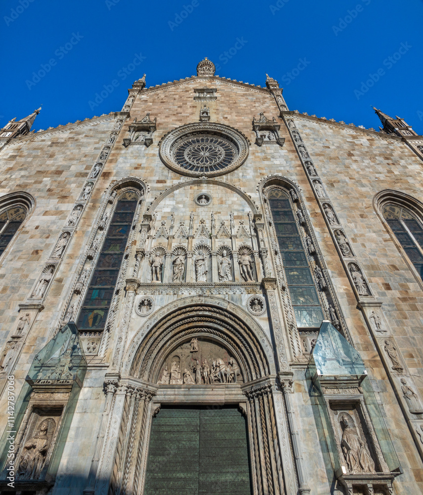 The gothic facade of Como Cathedral (Santa Maria Assunta or Duomo di Como) in the old town of Como, Lombardy, Italy The gothic facade of Como Cathedral (Santa Maria Assunta or Duomo di Como) in the old town of Como, Lombardy, Italy