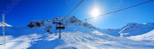 panoramic view of a mountain with ski lift full of snow in the sunlight