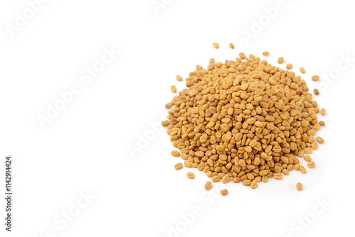 Dried Fenugreek Seeds in a Pile Positioned on Right Side of White Background with Copy Space photo