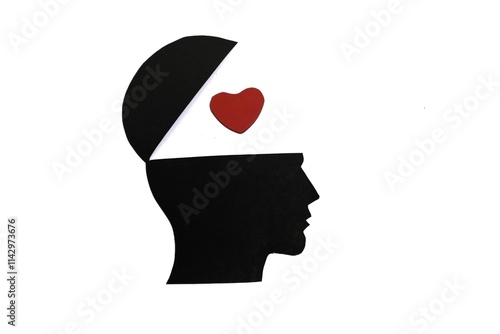 silhouette of head with open mind and heart symbol concept of falling in love and romance. top view. copy space for text photo