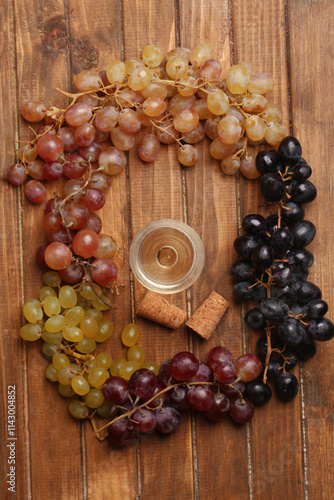 set of grape bunches on wooden table