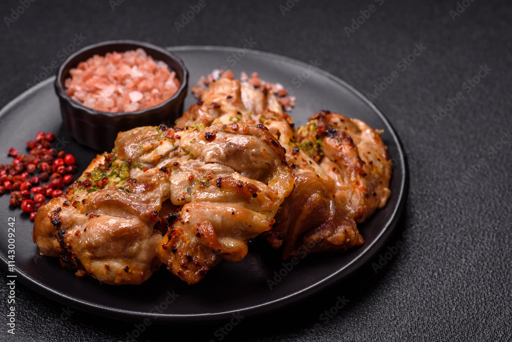 Grilled boneless chicken thigh with salt, spices and herbs Grilled boneless chicken thigh with salt, spices and herbs