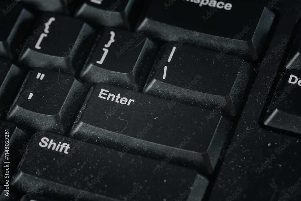 A black dusty computer keyboard. Close up. A black dusty computer keyboard. Close up.