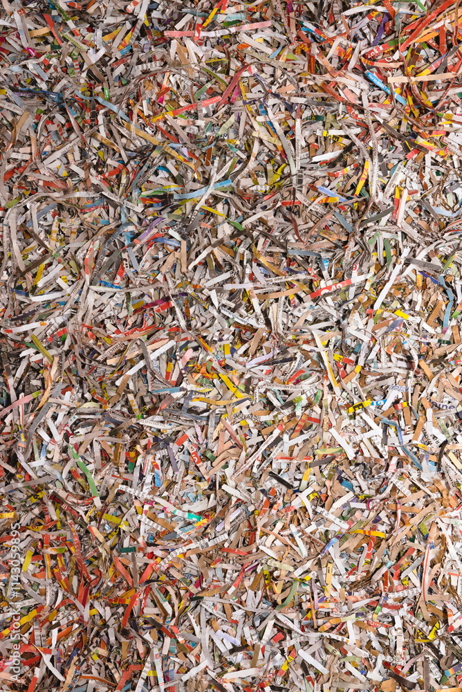 Papierschnipsel und Schreddergut als Hintergrund Papierschnipsel und Schreddergut als Hintergrund