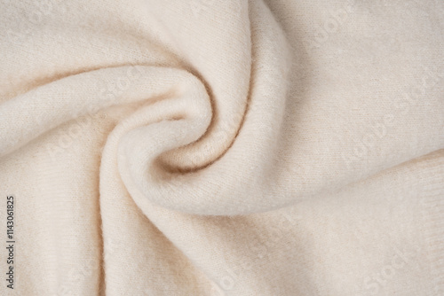 Beige sweater texture as a background. photo